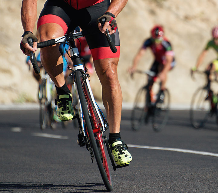 Triathlete training for a race on a bike