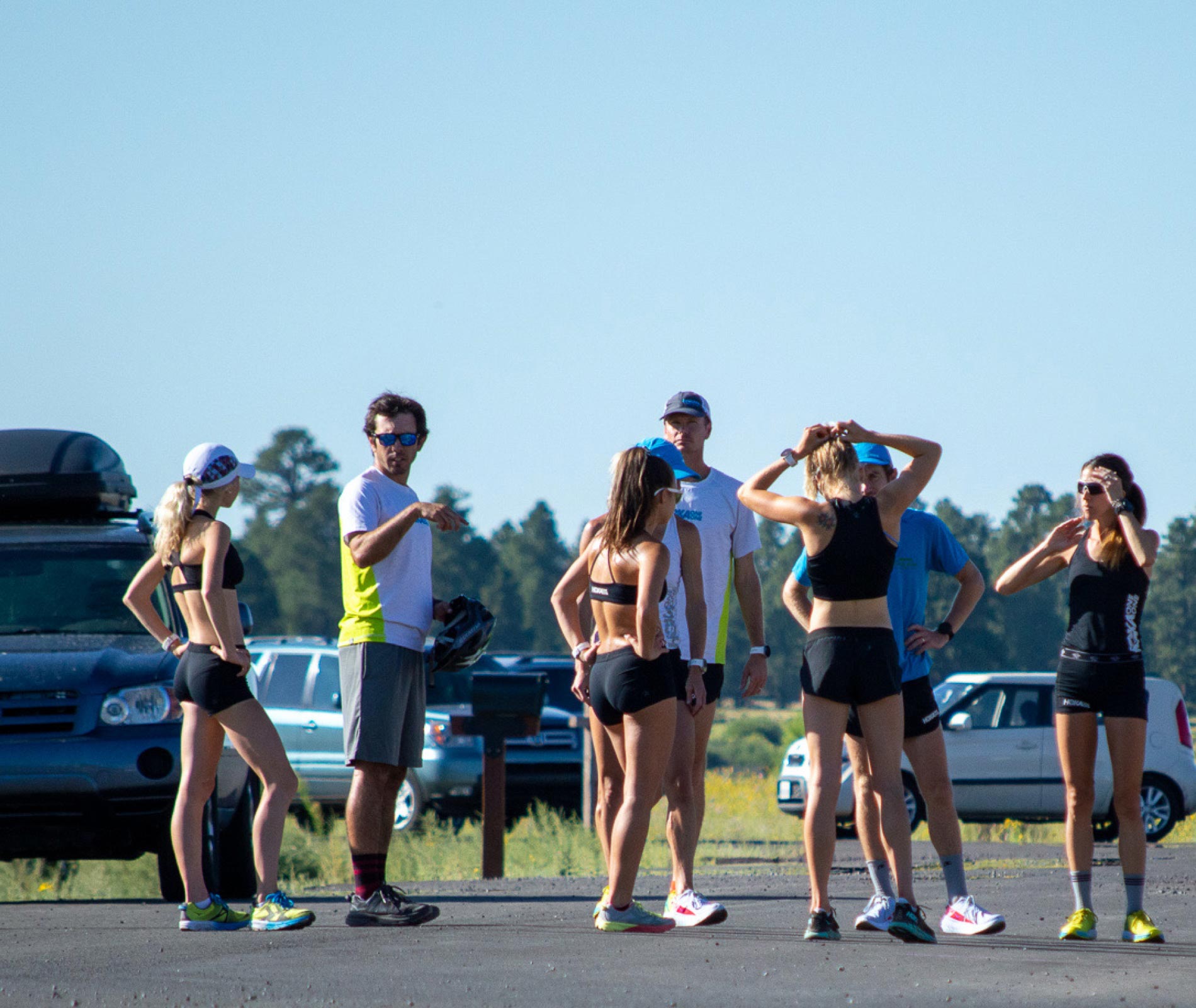 NAZ Elite coach Ben Rosario instructing runners before a workout starts